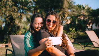 Two Gen Z social media users take a selfie