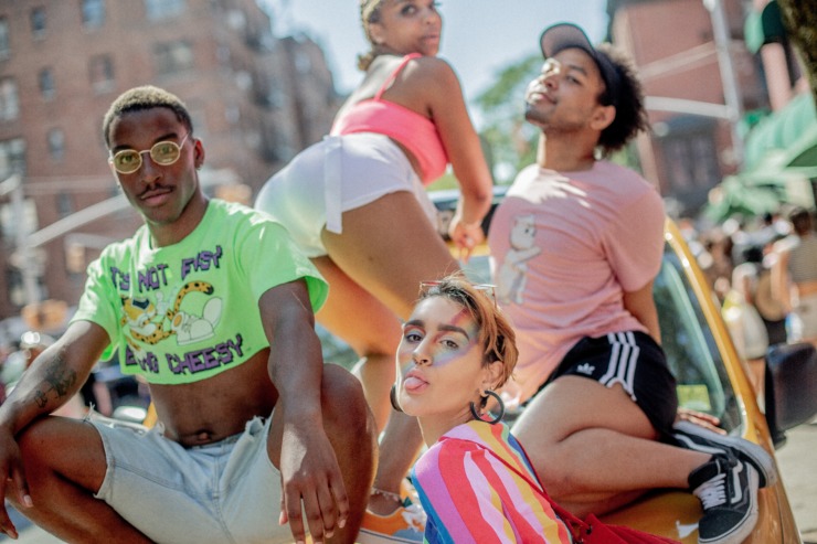 A group of young people gather at Pride 2019