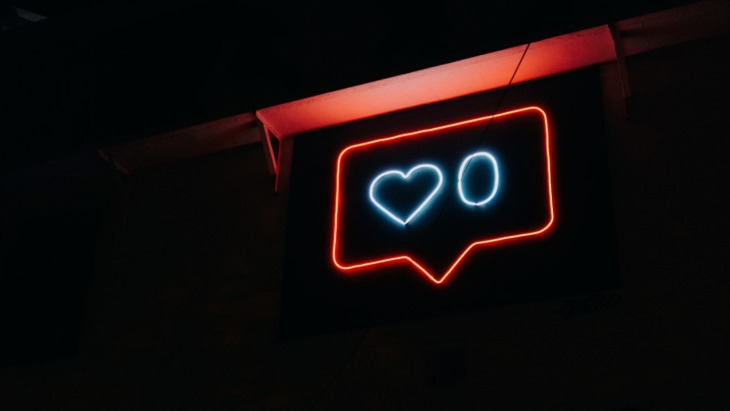 Neon sign of an Instagram 'Like' icon
