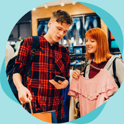Two students shopping in-store using Student Beans discount