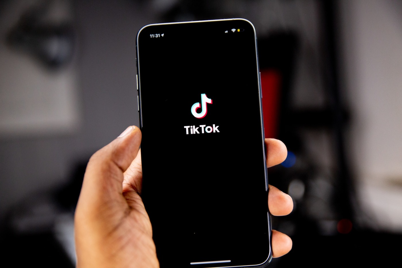 Phone screen featuring TikTok logo 