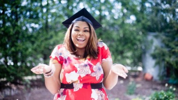 A woman celebrates graduation